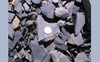  серебряная монета на вершине горы Мраморная